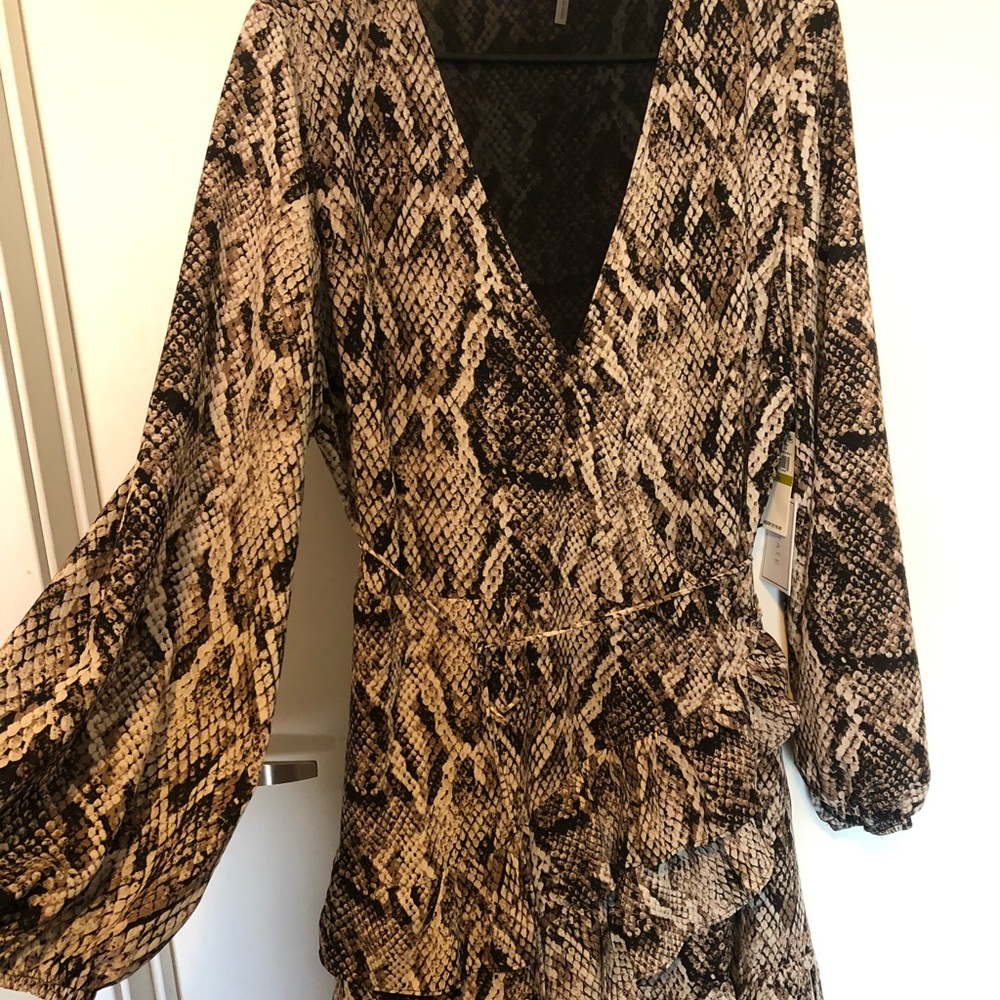 Dress size 14 but can fit down to a 10, is wrap dress so you can adjust the size
